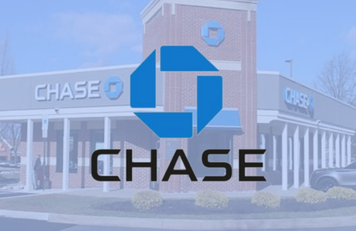 A chase bank with a blue logo in front of it