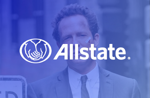 A man in a suit and tie is standing in front of an allstate logo.