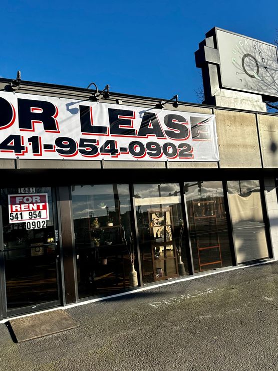 Commercial building with 'For Lease' sign and contact number, formerly a cannabis dispensary, available for rent at 1681