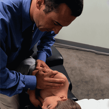 Boy And Chiropractor — Chiropractors in East Windsor, NJ