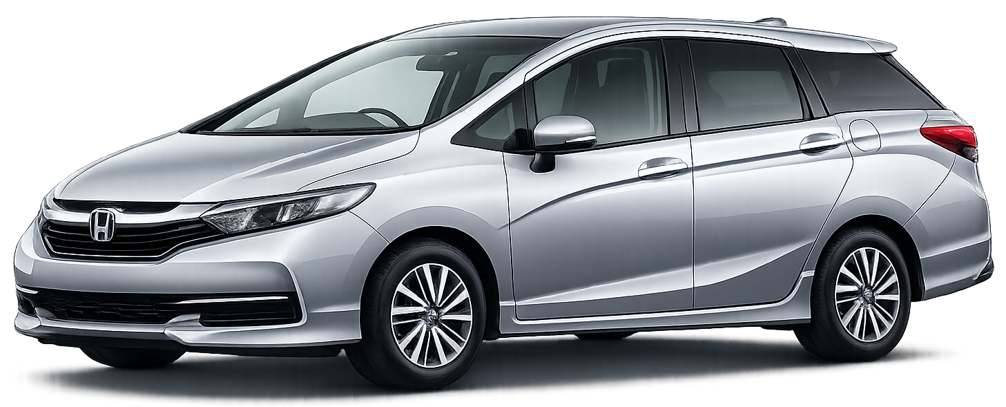 White Toyota Alphard van with tinted windows and custom wheels.