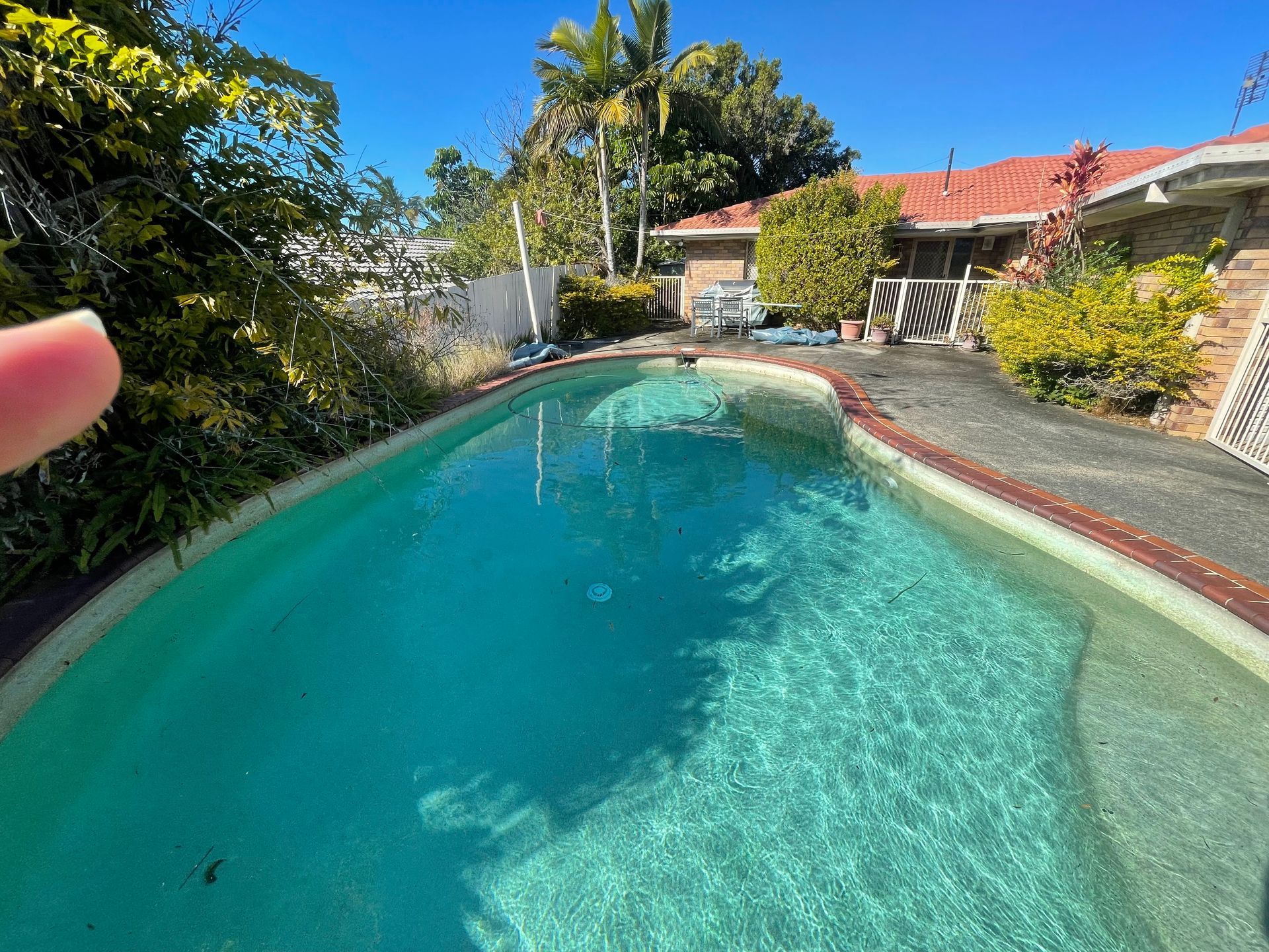 Swimming Pool With Clear Water, Surrounded by Concrete — Leak N Pool In Tweed Shire, NSW