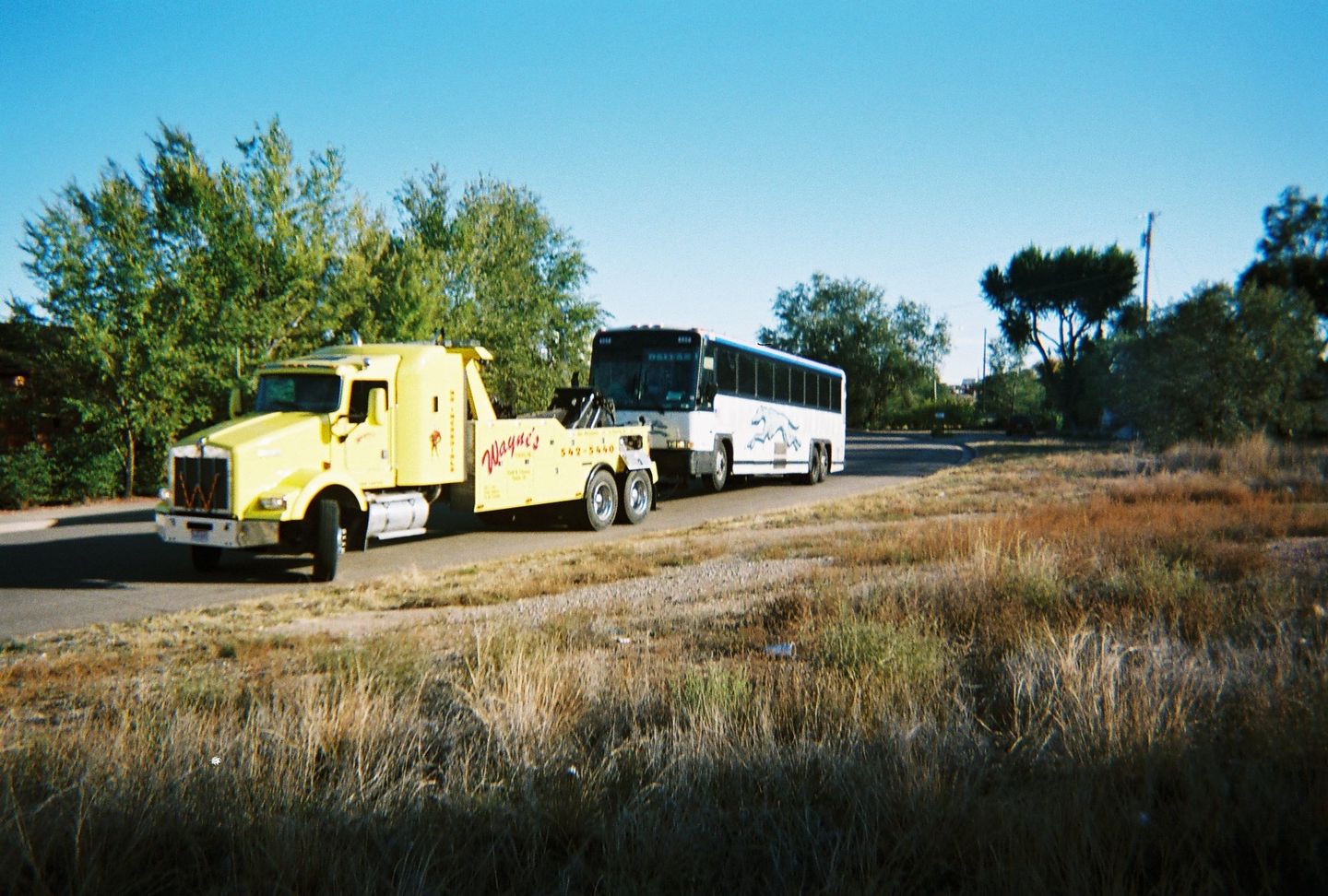 Tow Truck Pulling Bus - Towing Services in Pueblo,CO and the Surrounding Area