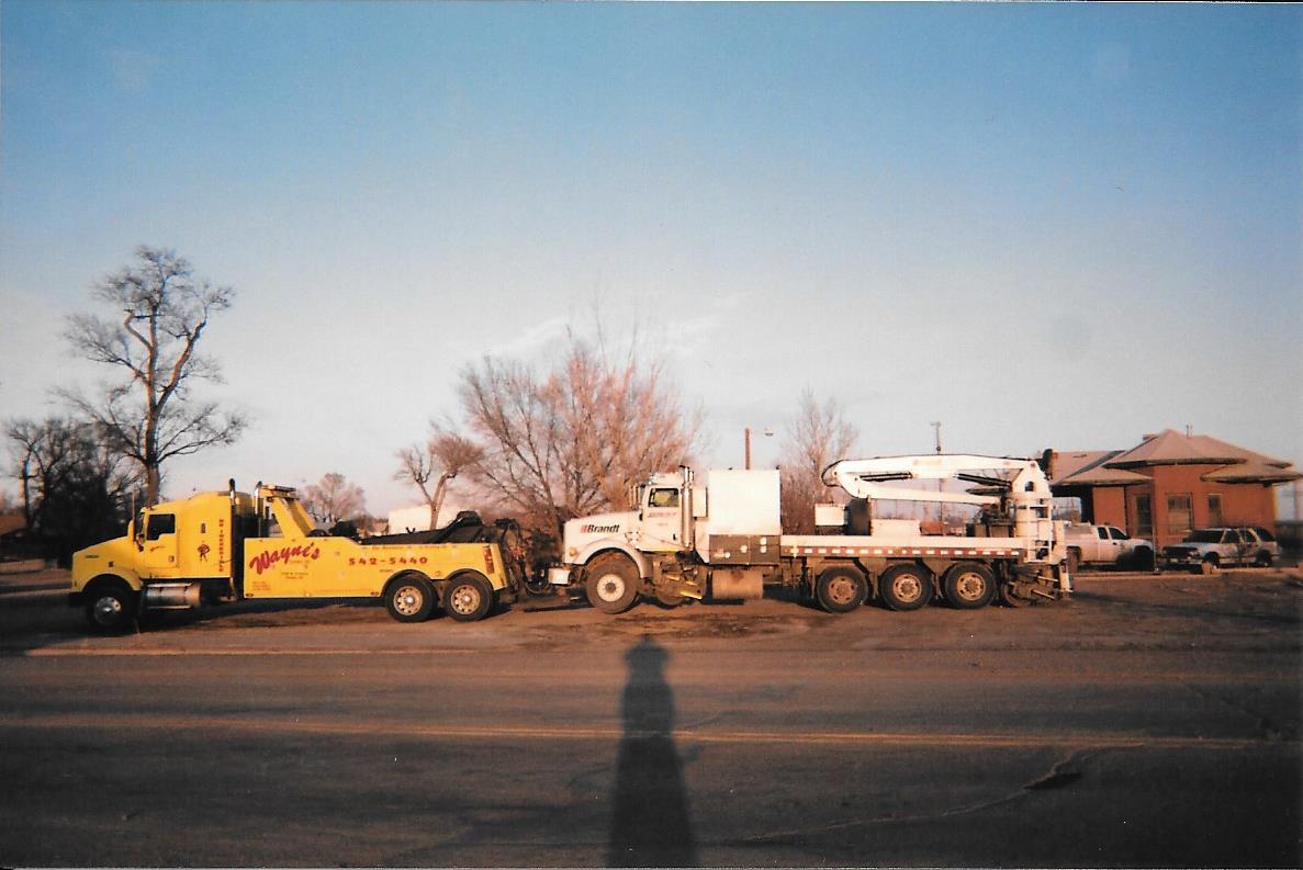 Tow Truck hauling Semi - Heavy Duty Towing Services in Pueblo, CO
