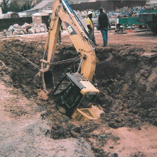Bulldozer Excavating Dirt - Equipment Hauling Services in Pueblo,CO and the Surrounding Area