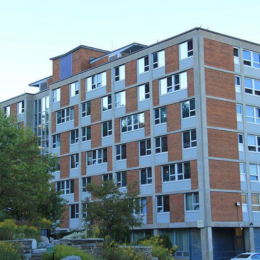 A large brick building with a lot of windows