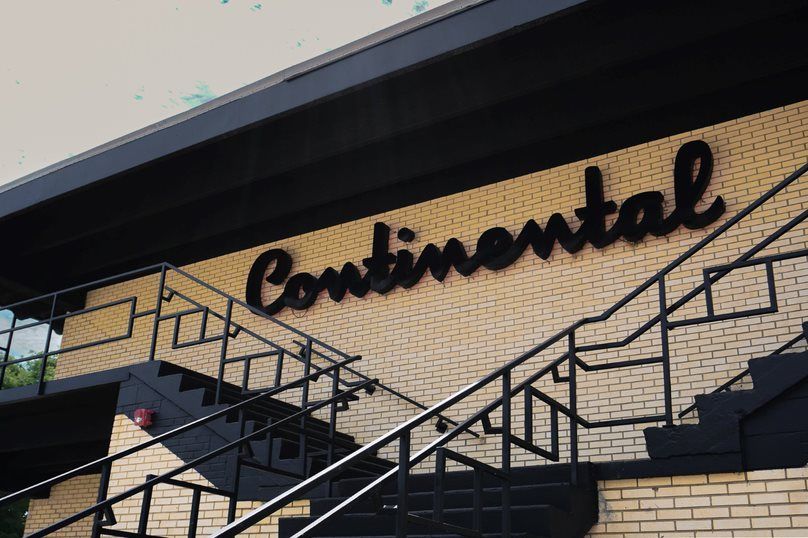 Continental Apartments sing