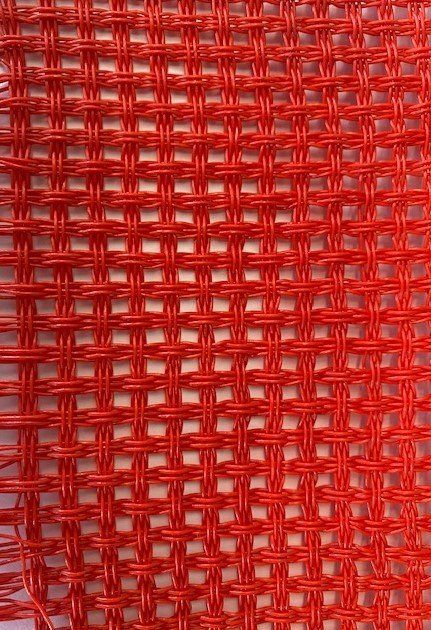 trama di un tessuto sintetico rosso