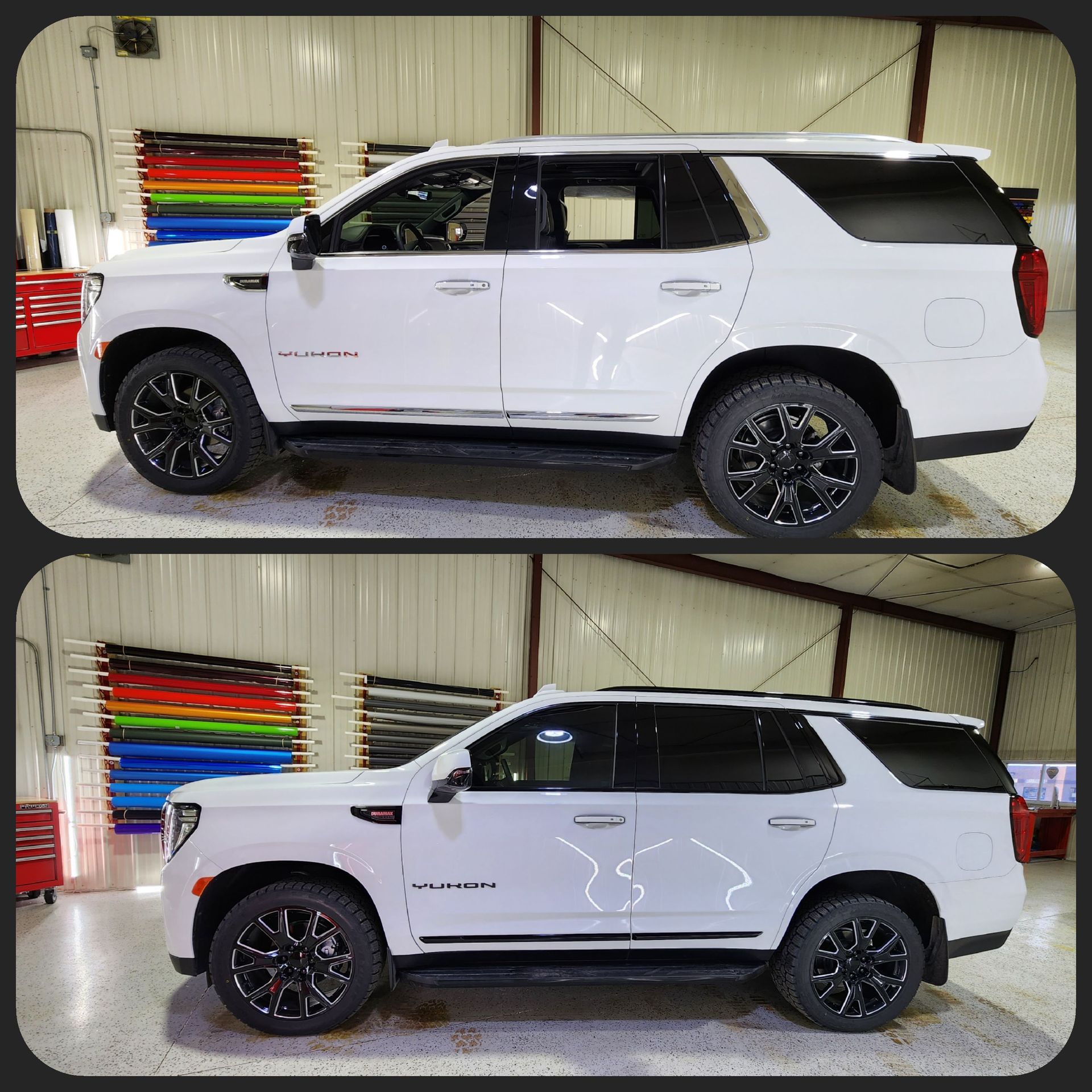 Two white GMC Yukon SUVs with black rims in a garage setting.