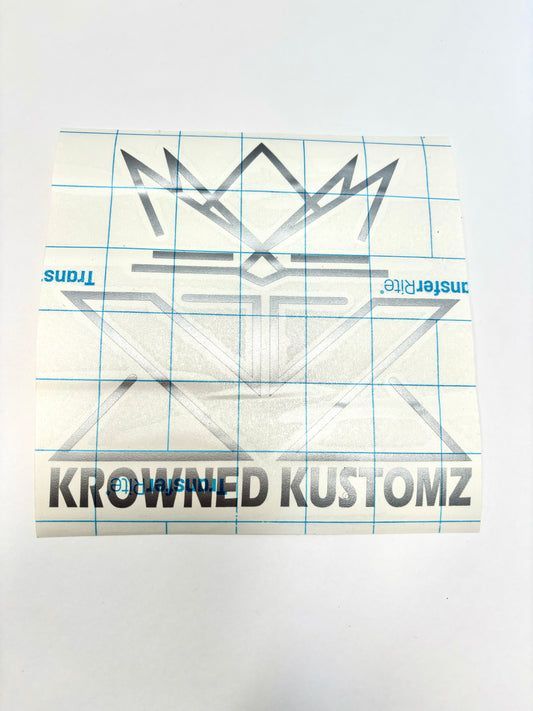 A sticker that says krowned kustomz on it