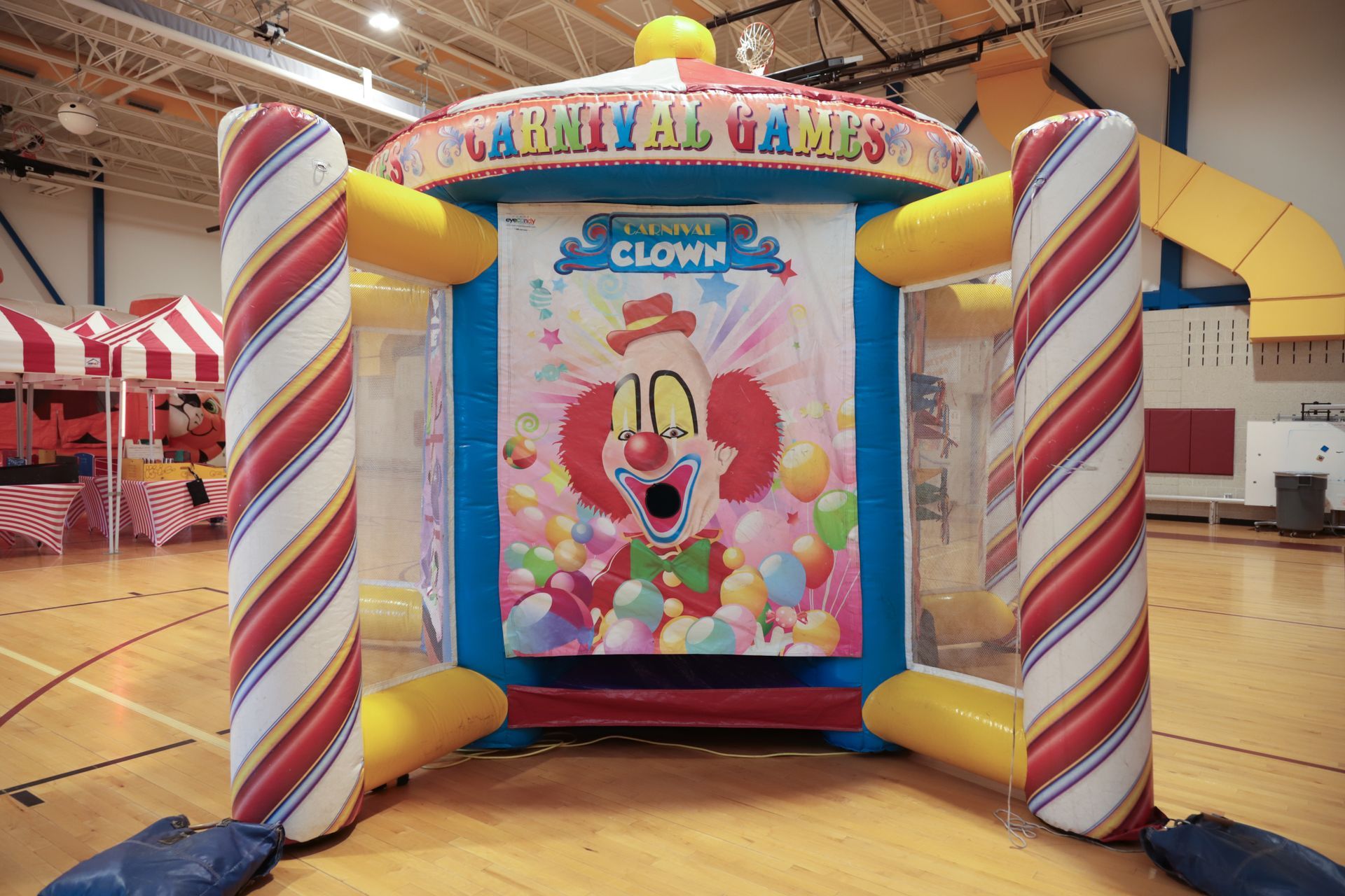 An inflatable carnival game with a clown on it