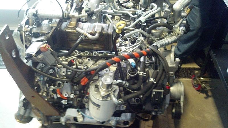 A very large engine with a lot of wires coming out of it | Autotrends