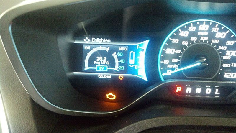 A close up of a car 's dashboard with a warning light on | Autotrends