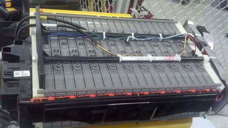 A bunch of batteries are sitting on top of each other | Autotrends