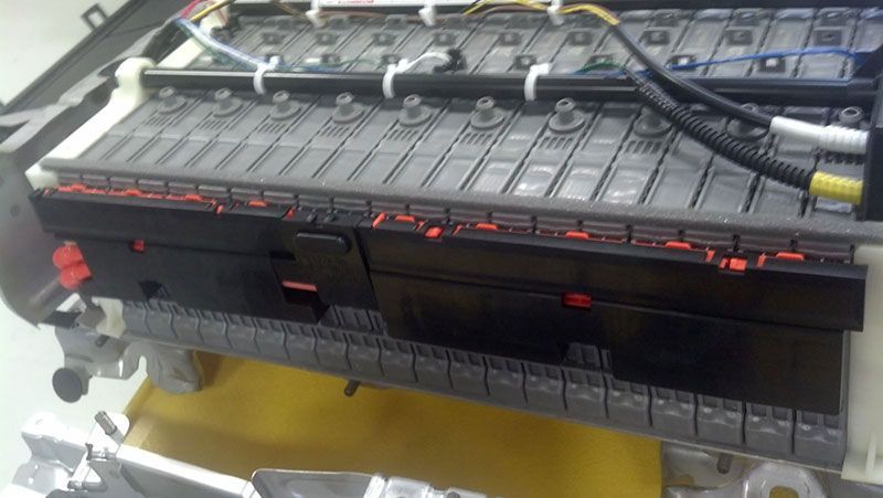 A bunch of batteries are sitting on top of each other on a table | Autotrends