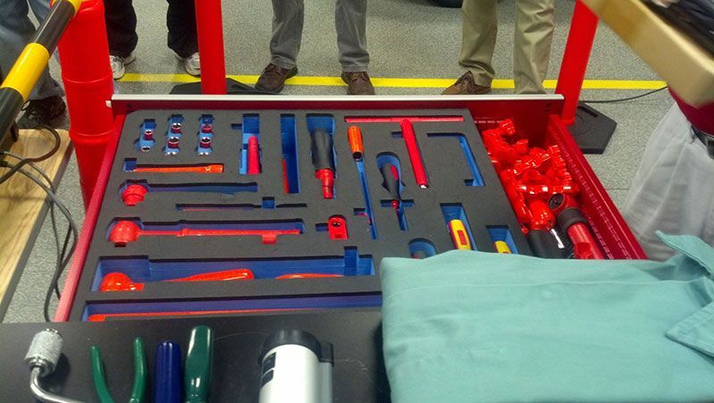 A bunch of tools are lined up on a table | Autotrends