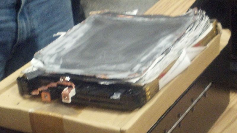 A cardboard box with a laptop inside of it | Autotrends