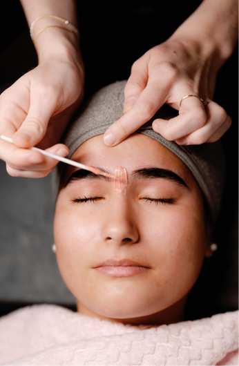 Woman receiving treatment at Sculpt Skin Solutions 