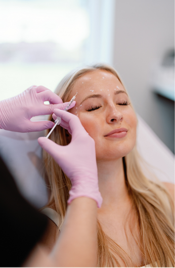 Woman receiving injections at Sculpt Skin Solutions 