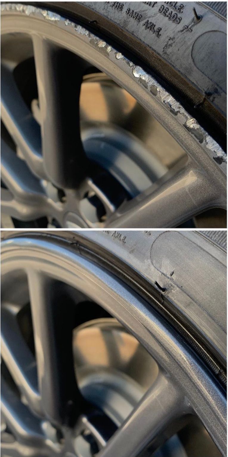 A close up of a car wheel with a tire on it.