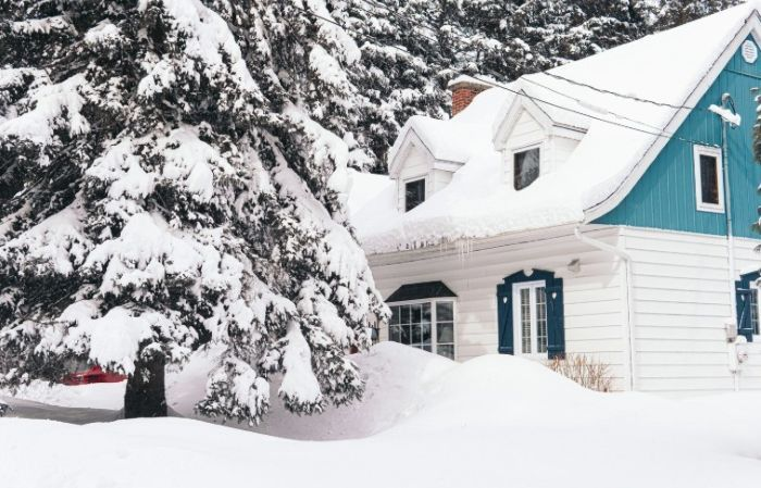 Pennsylvania house in snow, illustrating insulation for storm protection.