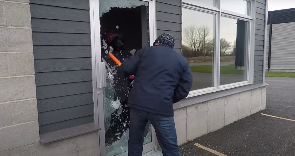 Glass breaks easily without security film, with a single hit.
