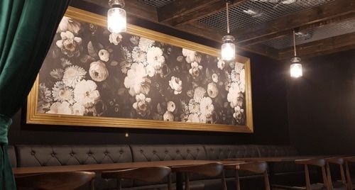 A Garage With Blue and Yellow Walls — Dezigner Finishes Professional Painting & Decorating in Palmview, QLD