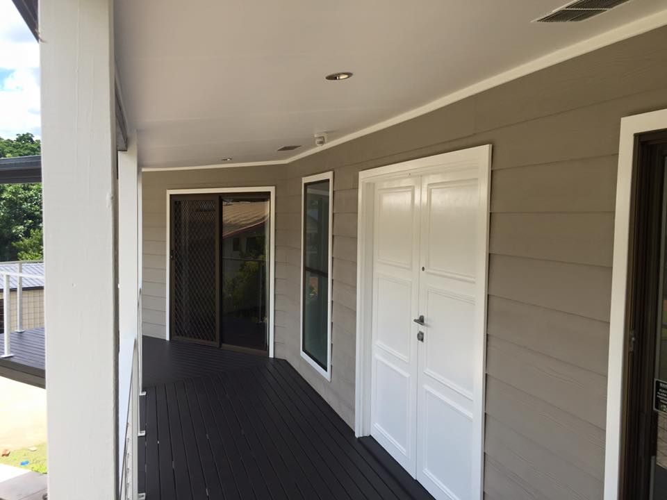 A House With a Porch and a White Door — Dezigner Finishes Professional Painting & Decorating in Sunshine Beach, QLD