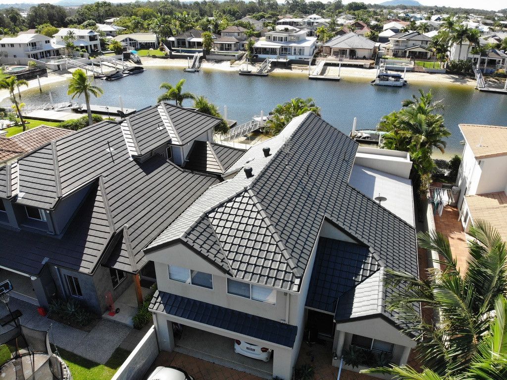 A Room With a Black Ceiling and a White Wall — Dezigner Finishes Professional Painting & Decorating in Palmview, QLD