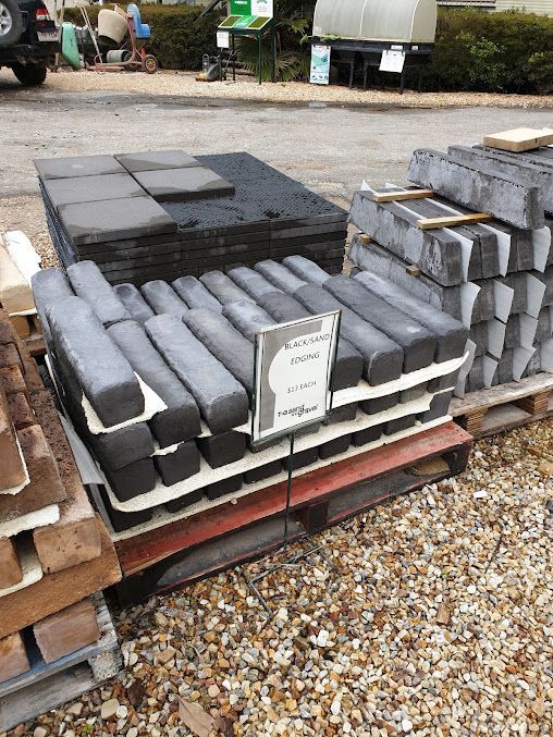 A Pile Of Concrete Blocks Sitting On Top Of A Wooden Pallet — T&G Sand and Gravel In Sippy Downs, QLD