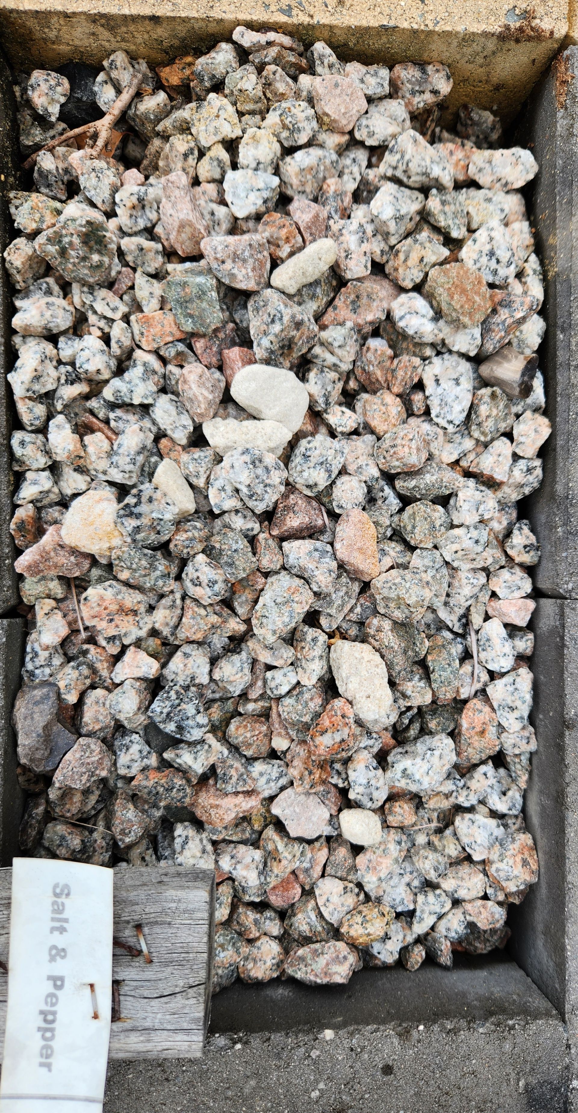 Salt and Pepper Gravel in a Wooden Container — T&G Sand and Gravel In Sippy Downs, QLD