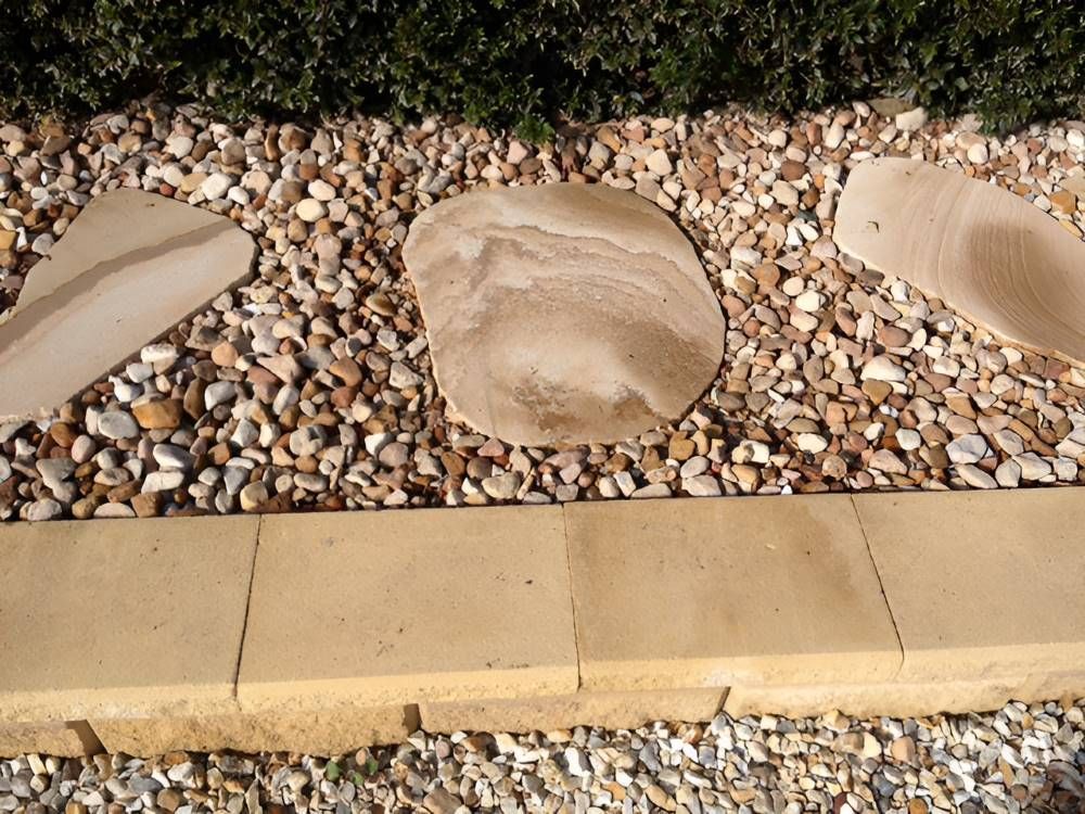 A Row Of Rocks Sitting On Top Of A Pile Of Gravel — T&G Sand and Gravel In Kawana, QLD