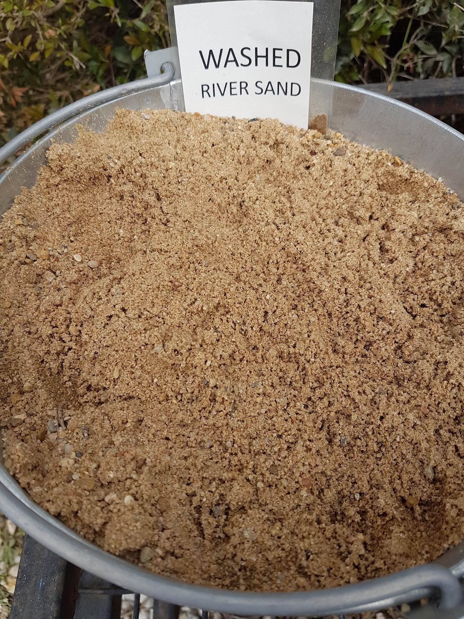 A Bucket Of Washed River Sand With A Sign On It — T&G Sand and Gravel In Sippy Downs, QLD