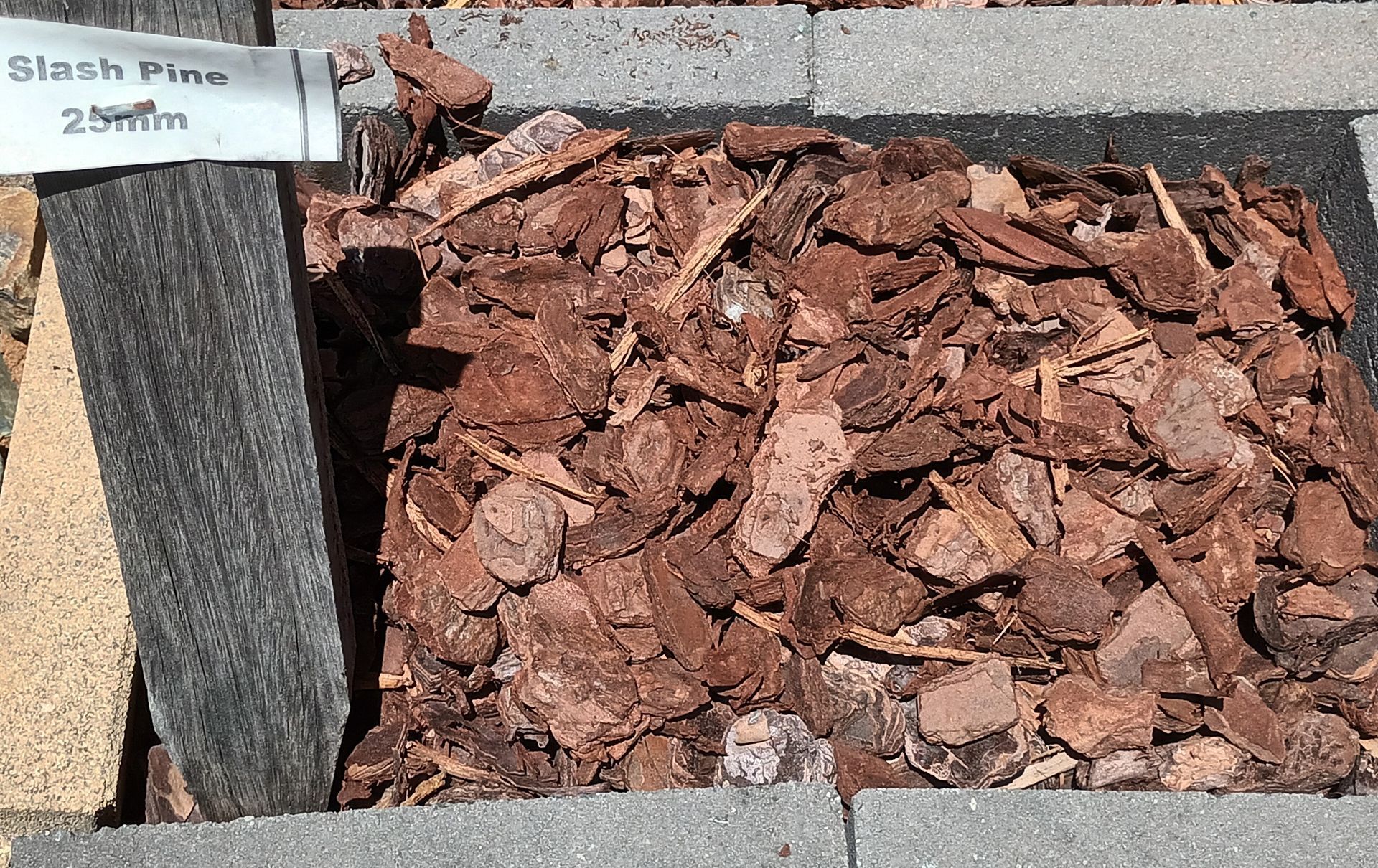 A Pile Of Slash 25mm Mulch— T&G Sand and Gravel In Sippy Downs, QLD