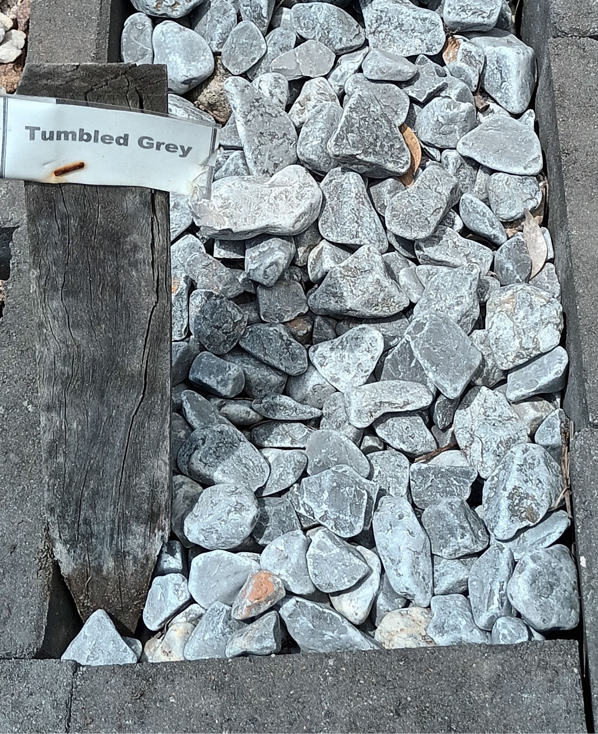 A Pile of Tumbled Grey Stones— T&G Sand and Gravel In Sippy Downs, QLD