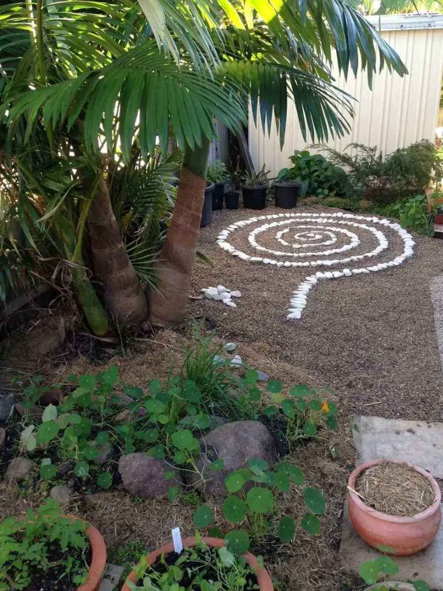 A Garden With A Spiral Of Rocks In The Middle Of It — T&G Sand and Gravel In Sippy Downs, QLD
