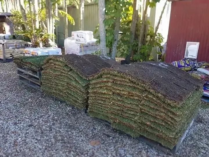 A Pile Of Grass Is Sitting On Top Of A Pile Of Gravel — T&G Sand and Gravel In Sippy Downs, QLD