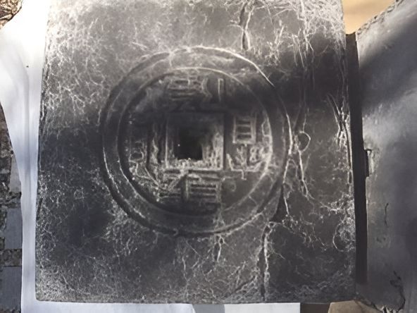 A Piece Of Stone With Chinese Writing On It — T&G Sand and Gravel In Sippy Downs, QLD