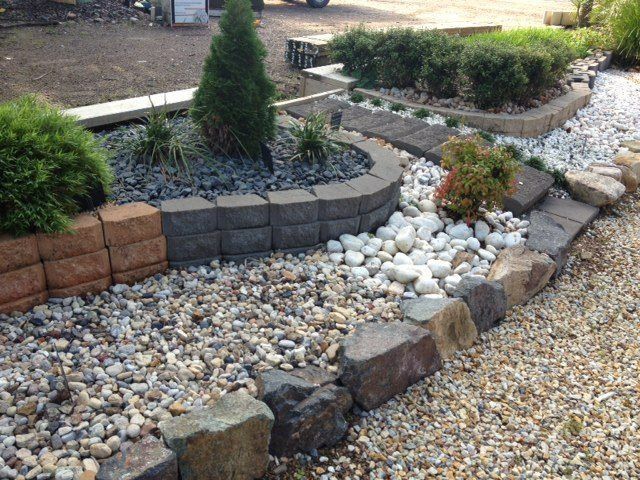 Landscaped Garden Bed With Stone and Rock Borders — T&G Sand and Gravel In Bli Bli, QLD