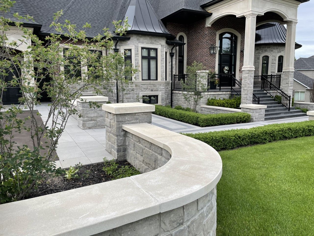 huge house with hardscape and softscape elements