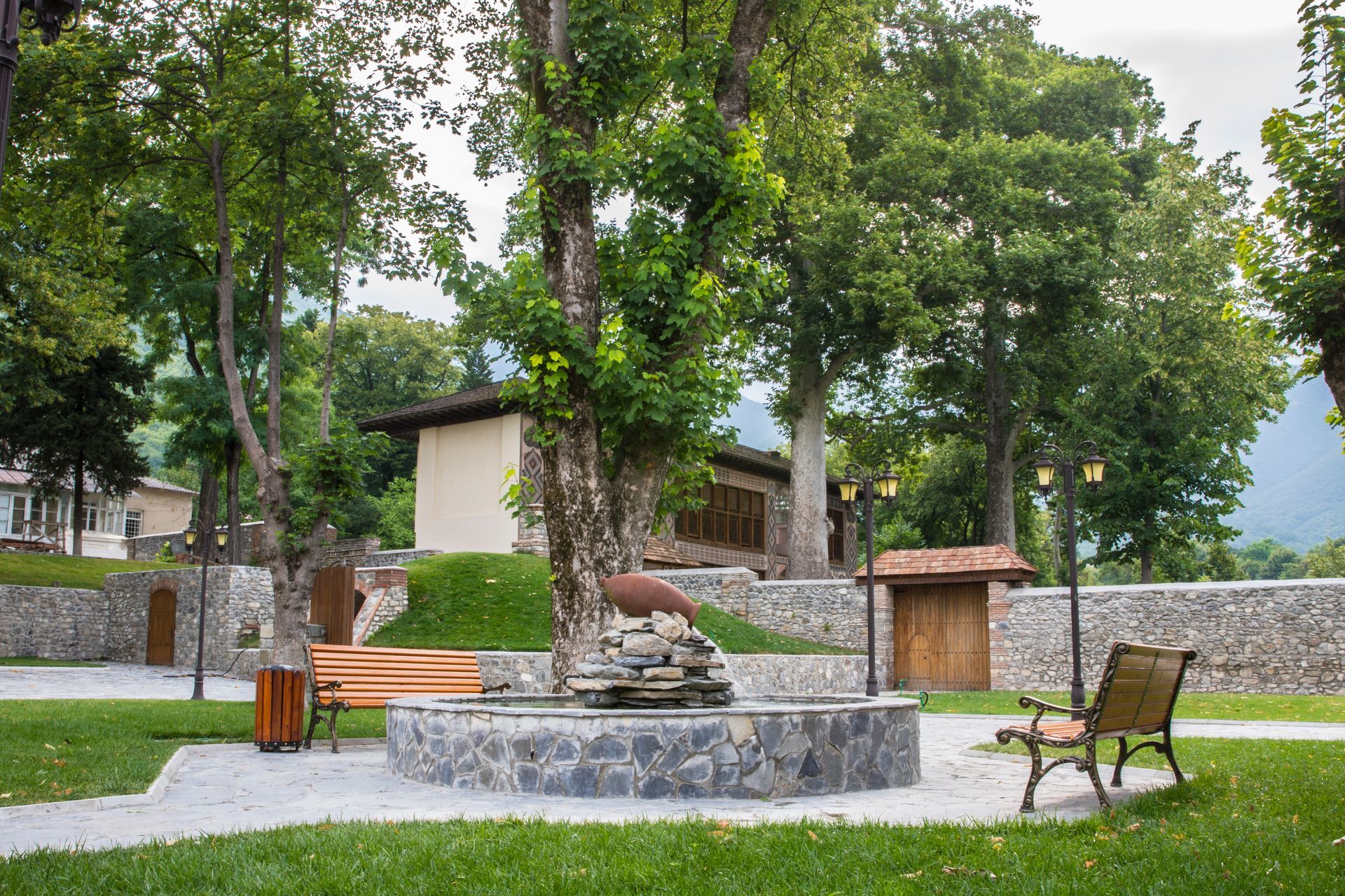 park with benches and a fireplace