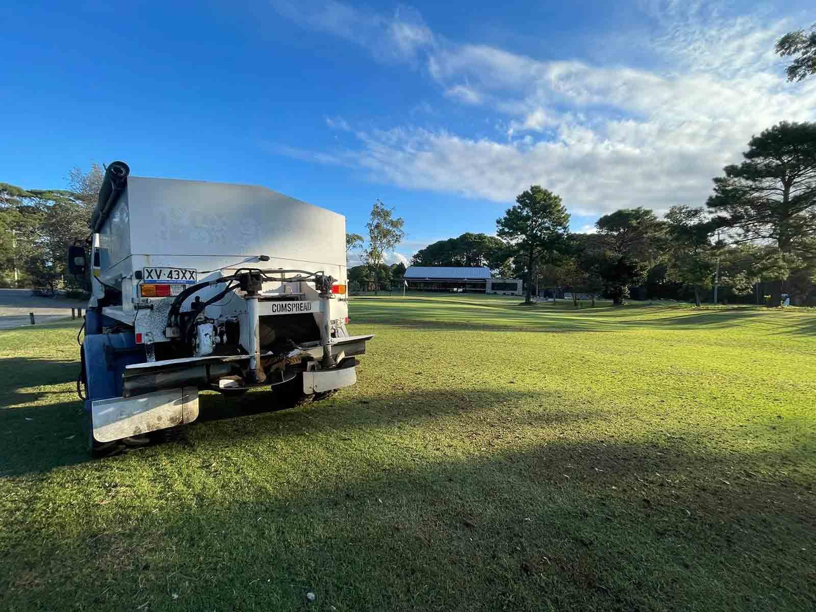 A White Truck Is Parked In A Grassy Field — Dillon Rural In Cundletown, NSW