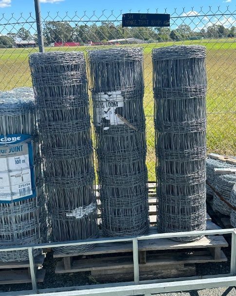A Bunch Of Wire Fence Sitting On Top Of A Wooden Pallet — Dillon Rural In Kew, NSW