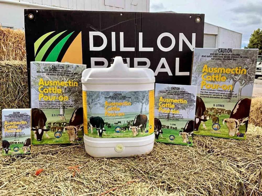 A Bottle Of Dillon Paral Is Sitting On Top Of A Pile Of Hay — Dillon Rural In Cundletown, NSW