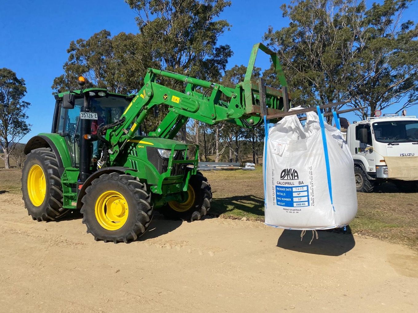 Green Tractor lifting bags — Dillon Rural In Cundletown, NSW