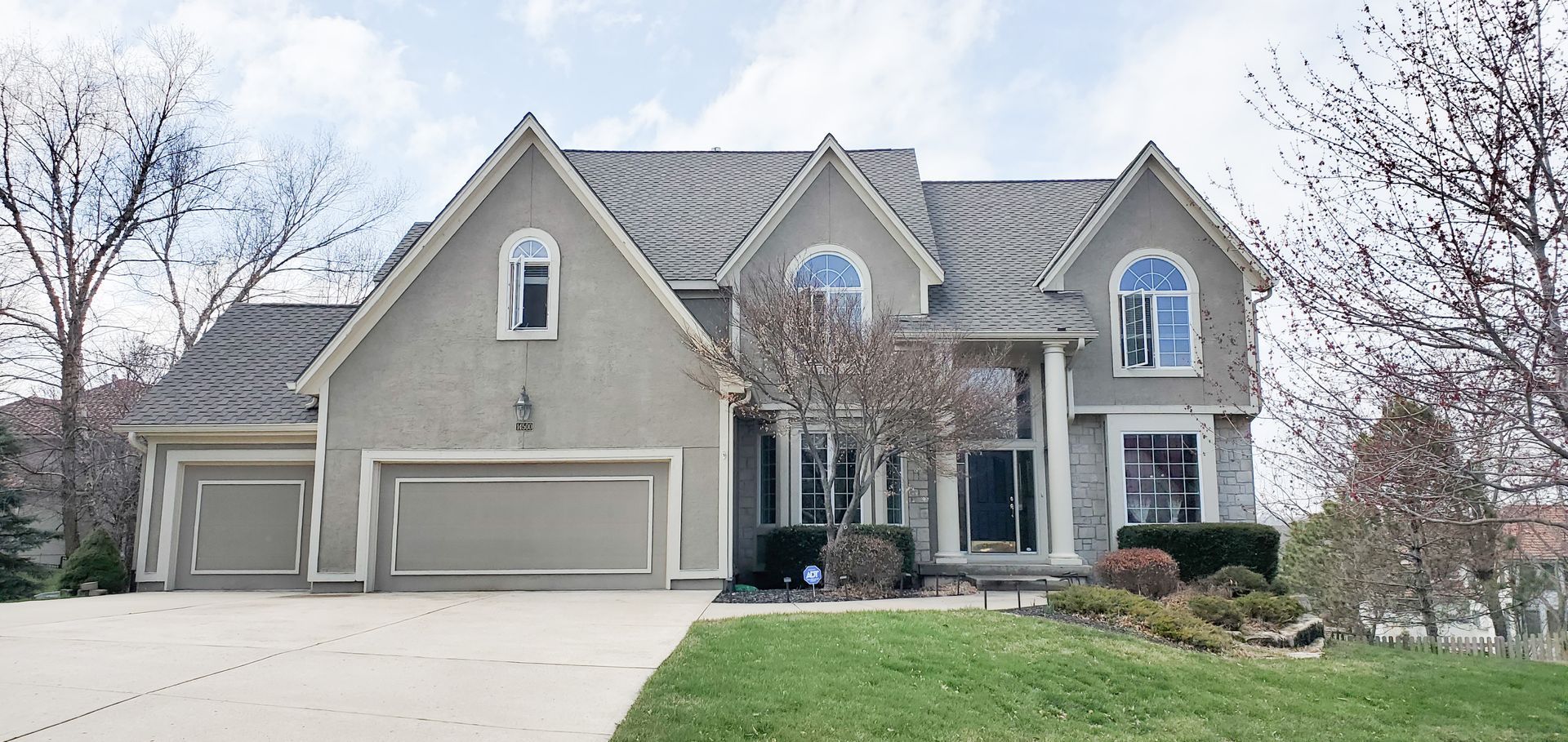 Home Pros Painting exterior house painted before Lenexa KS