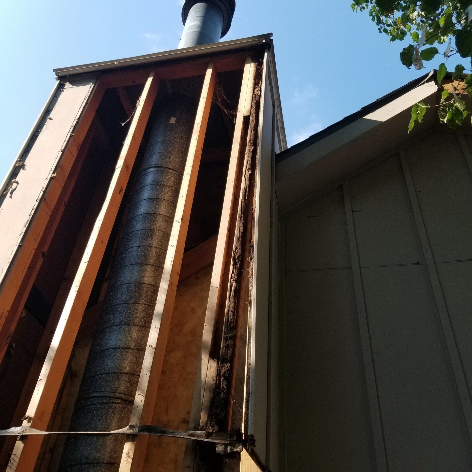 Removed siding at chimney and discovered rotted framing Olathe.