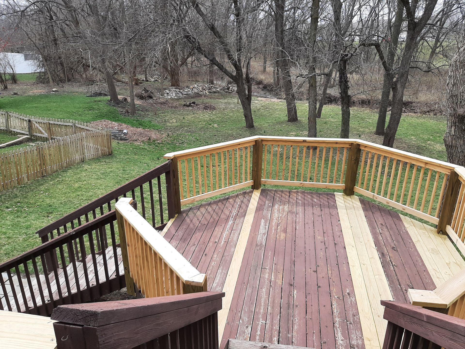 wood deck floor boards repaired by Home Pros