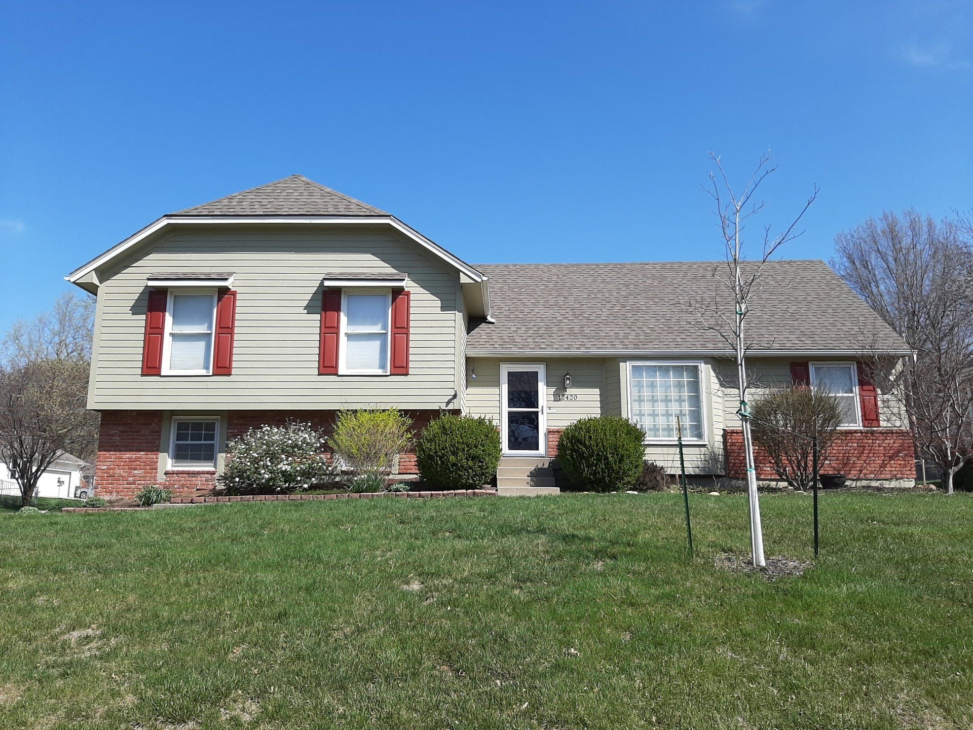 Home Pros Painting exterior house painted before Lenexa KS