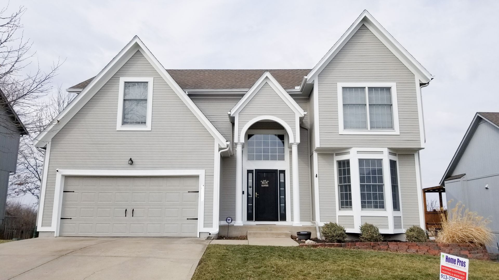 Home Pros Painting and Home Repairs exterior house painted after Olathe KS